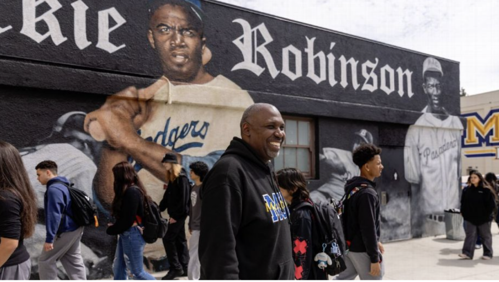 At Jackie Robinson’s high school, students rebuild after fire